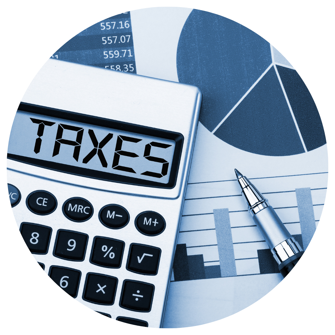 taxes written on calculator with graph and pen in background
