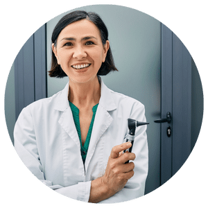 physician standing in front of door while wearing lab coat