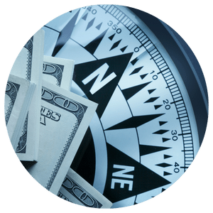 compass with money on top 