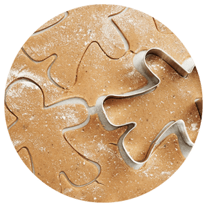 gingerbread man cookie cutter on dough